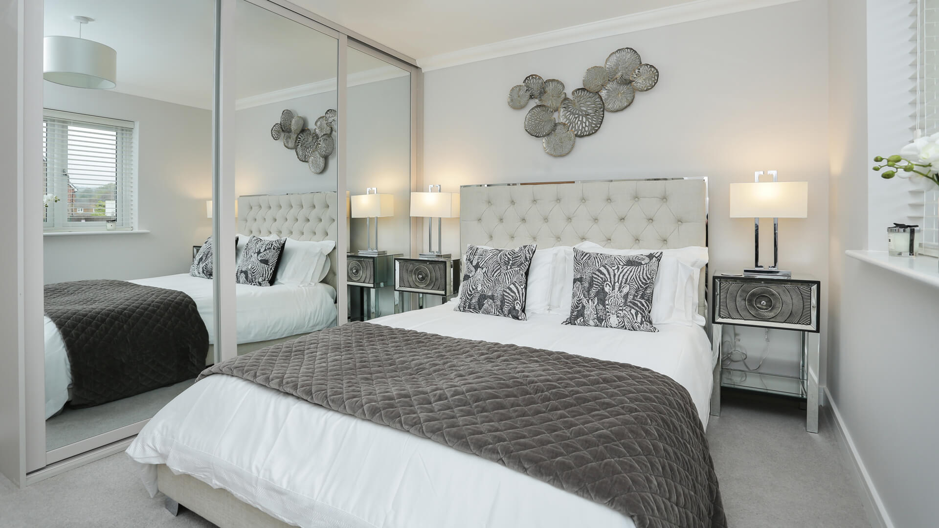 Double bed in dressed room with fitted wardrobes at our Churchfields development.