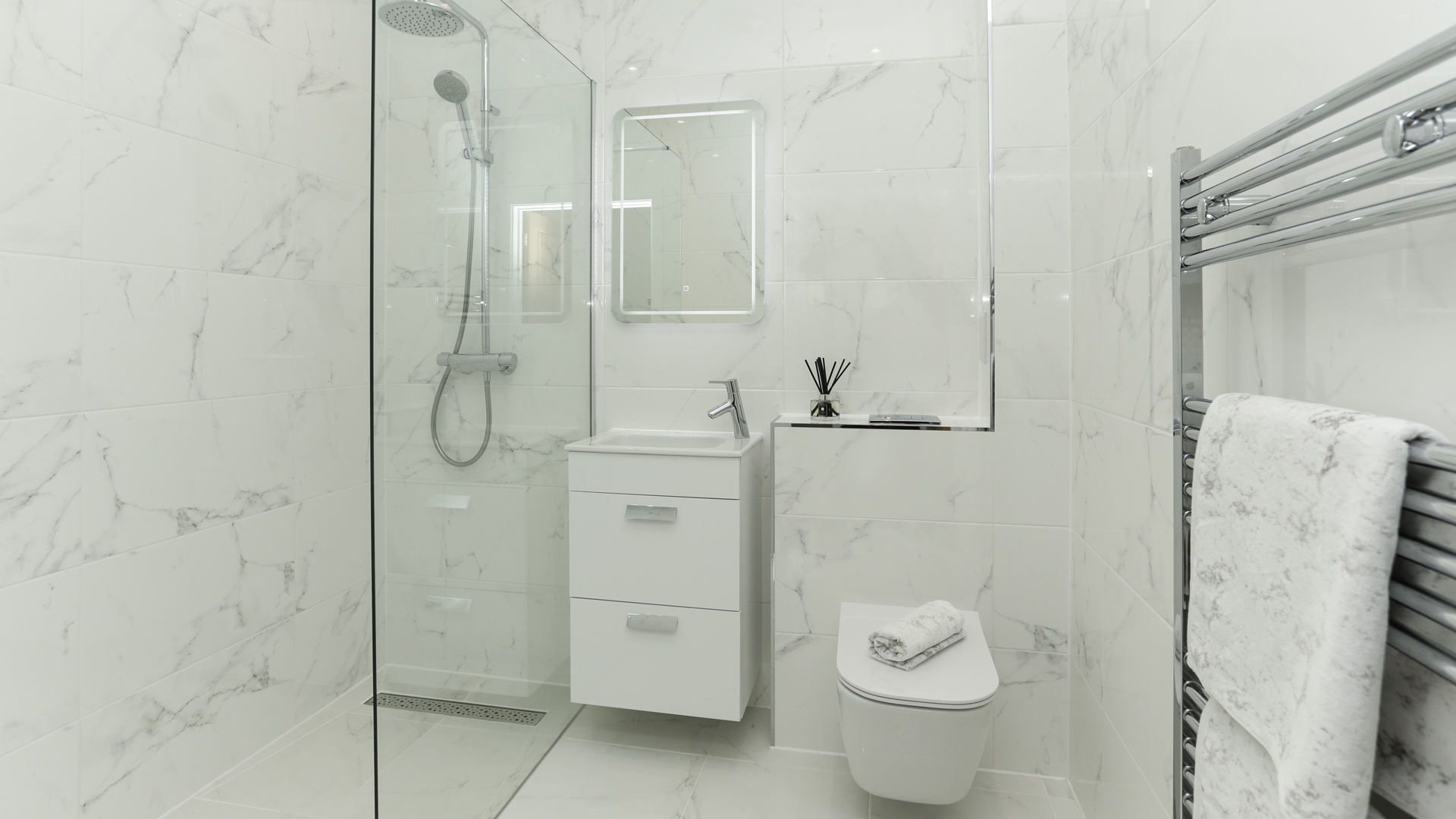 Cobnut Park plot 6 shower room with white Porcelanosa tiles