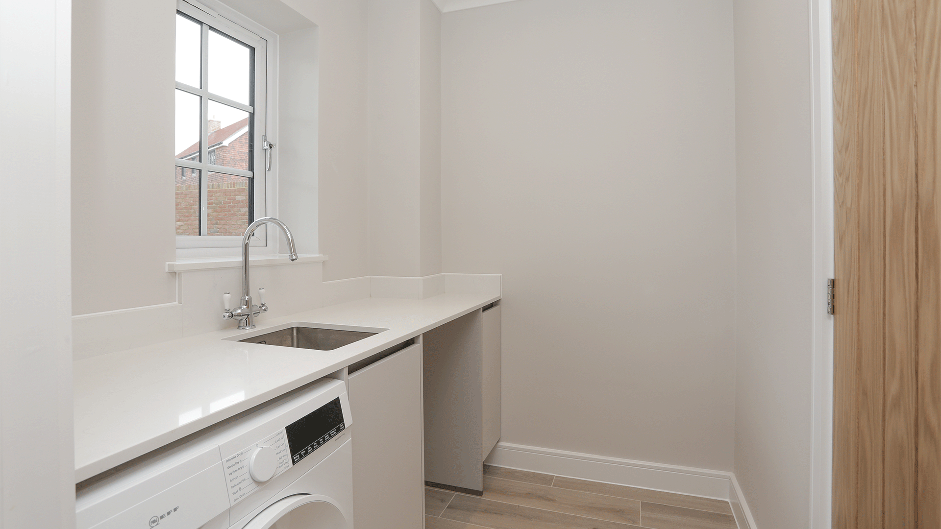 Utility room with washing machine and storage space at Miller's Meadow plot 15