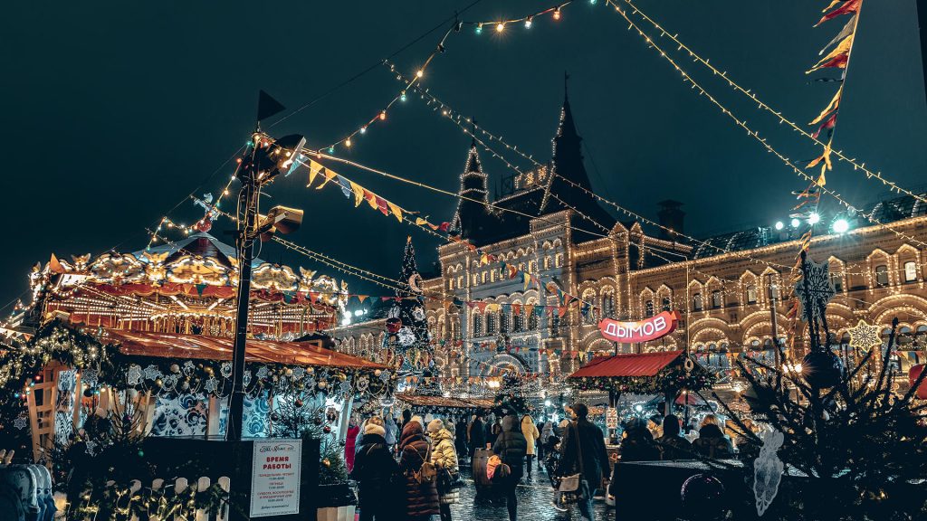 Christmas market in Europe with lights, stalls and festive decorations