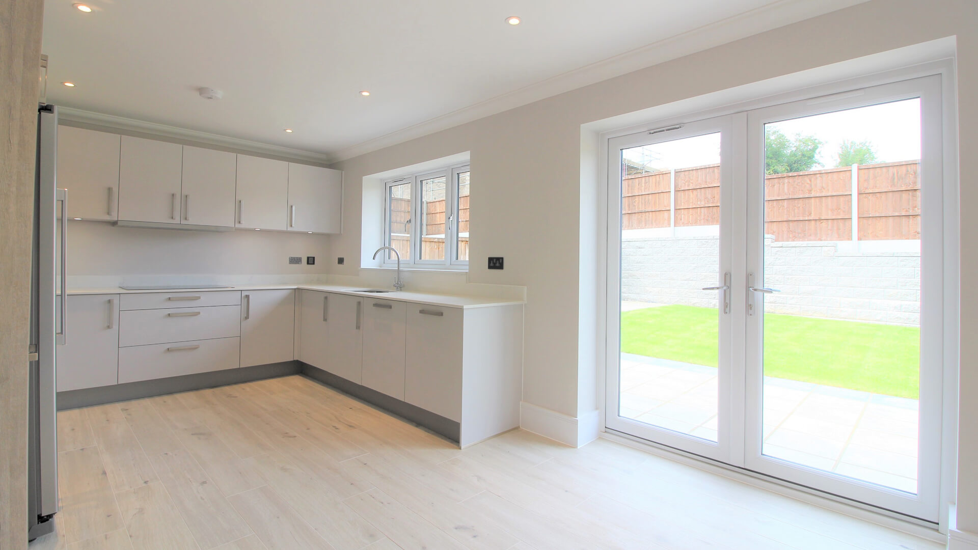White fitted kitchen at Woodside court.