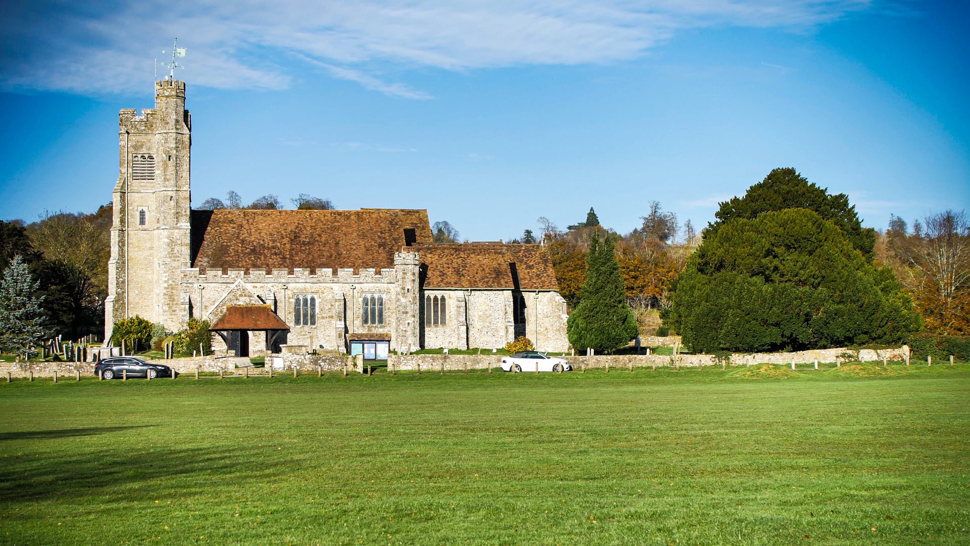 Harrietsham Church with green field in front