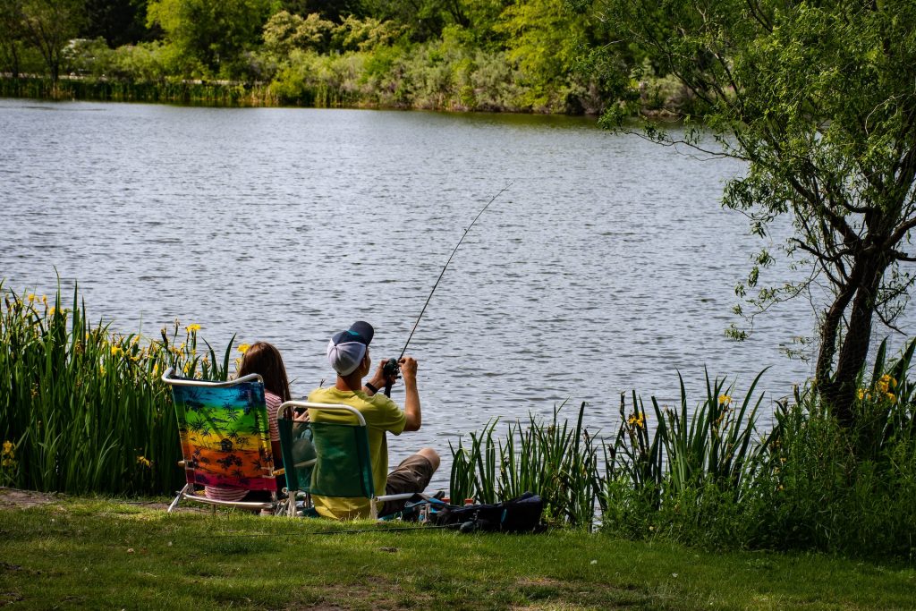 Fishing by a lake