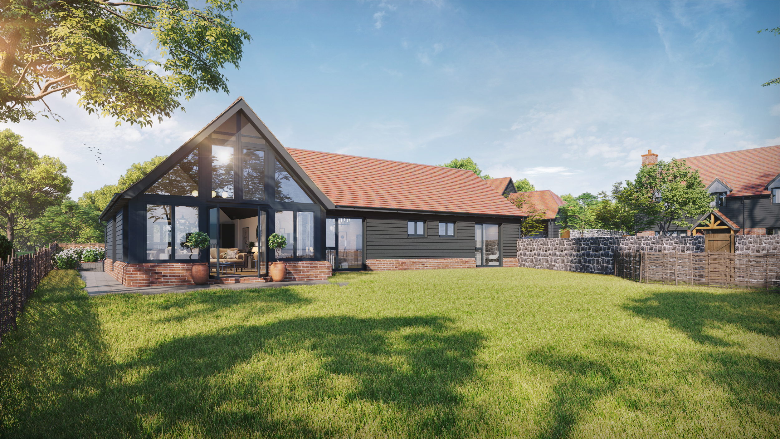 CGI of the rear garden of a bungalow with red roof tiles, and grey cladding. A large glass window to one side.