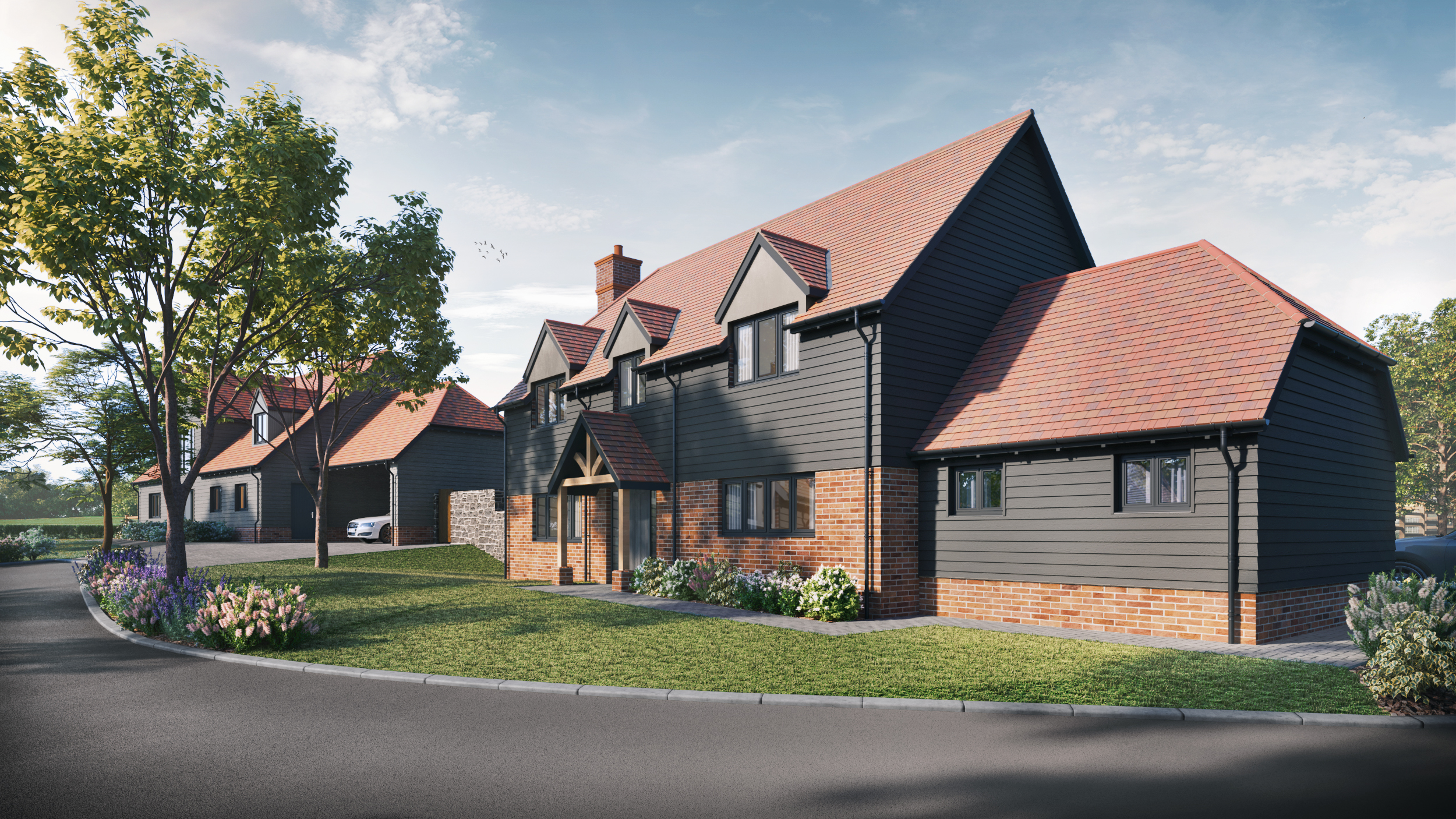 CGI of two detached houses with red roof tiles and grey cladding