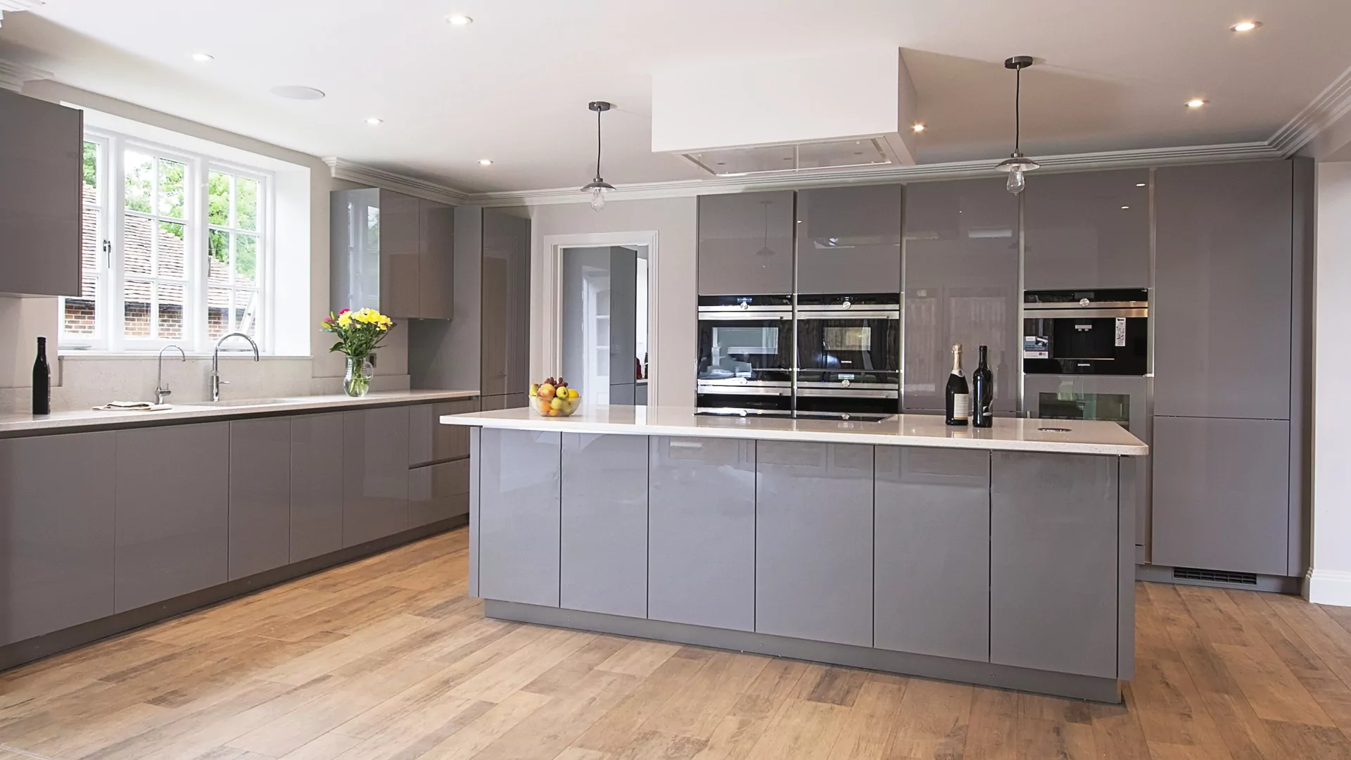 Grey gloss fitted kitchen