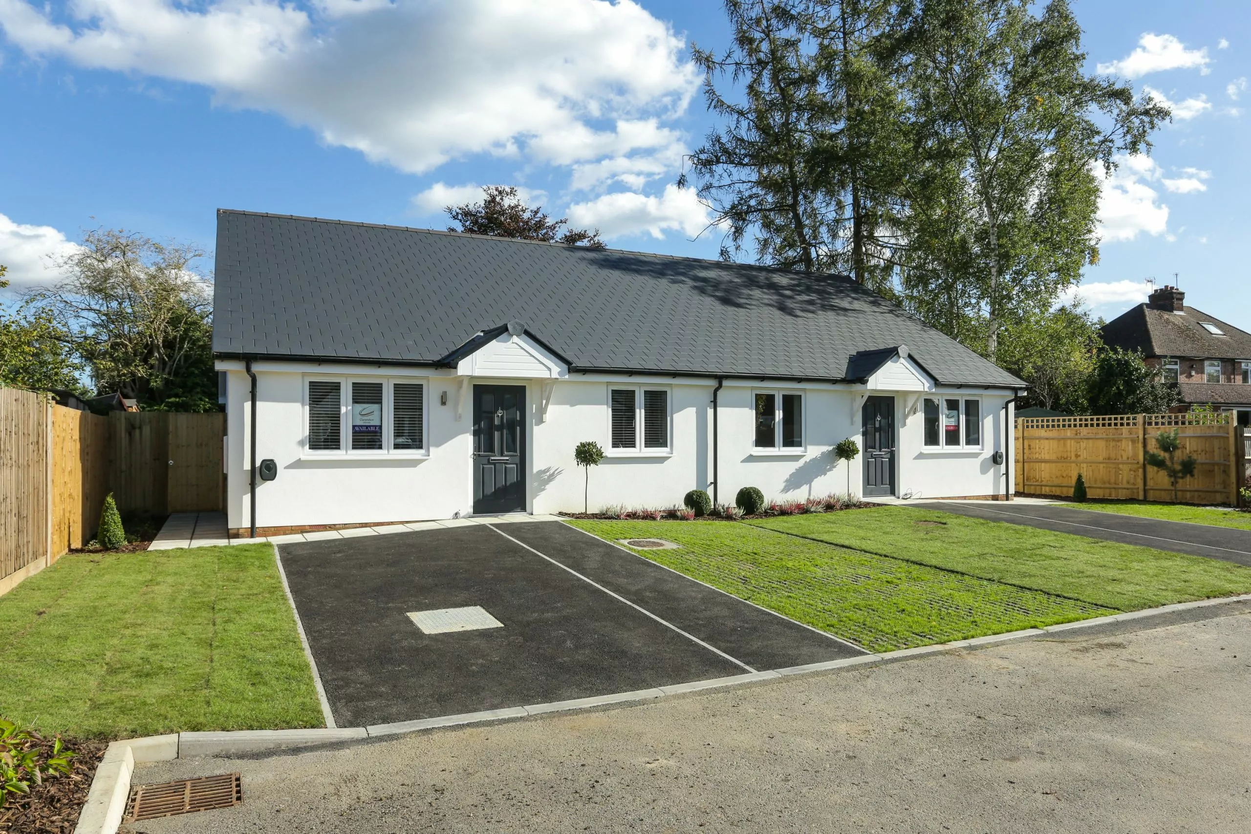 Two new build bungalows at Mulberry Place Phase 2 with landscaped front lawns