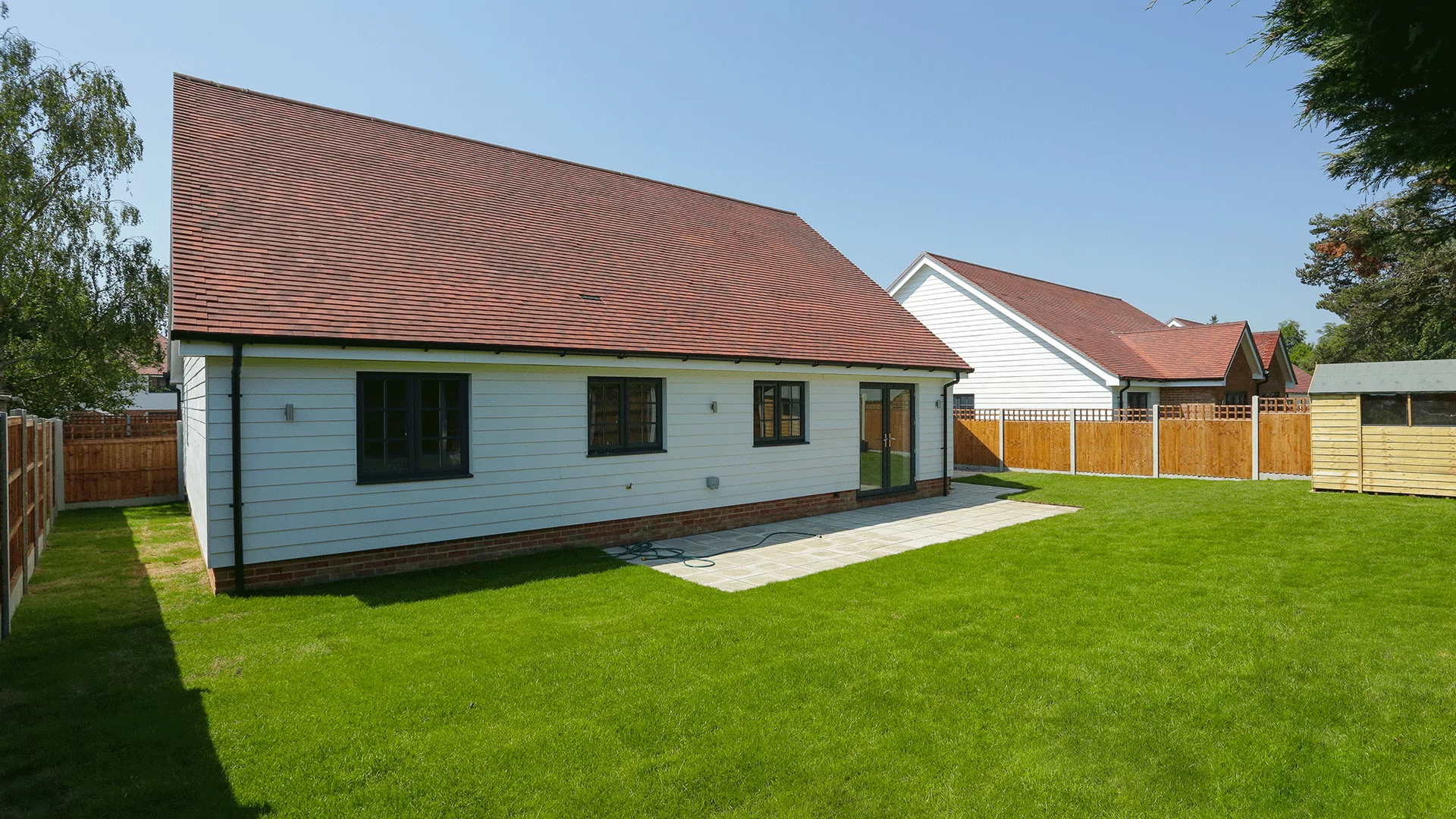 New build bungalow landscaped garden with a shed at Miller's Meadow plot 9